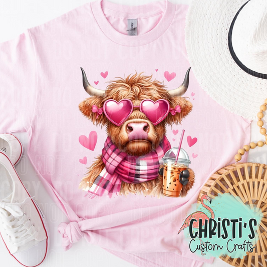Highland Cow drinking iced Coffee