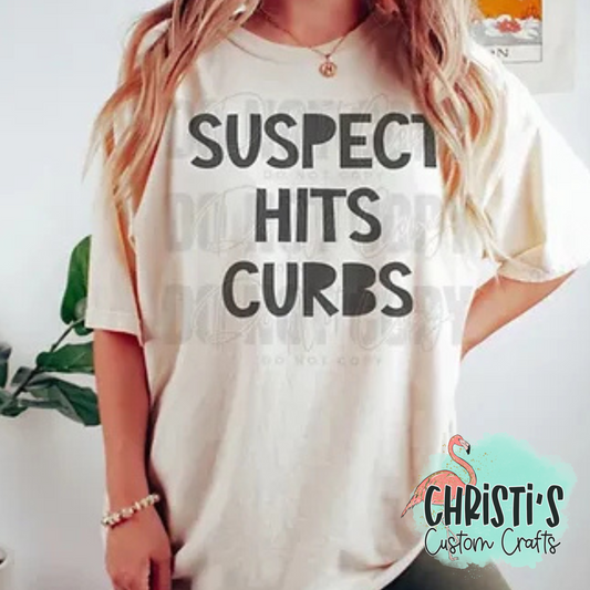 Suspect Hits Curbs