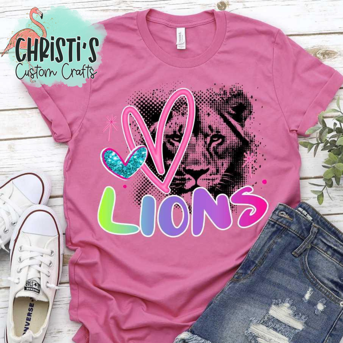 Black Dot Mascot with Rainbow Mascot Name and Pink Heart
