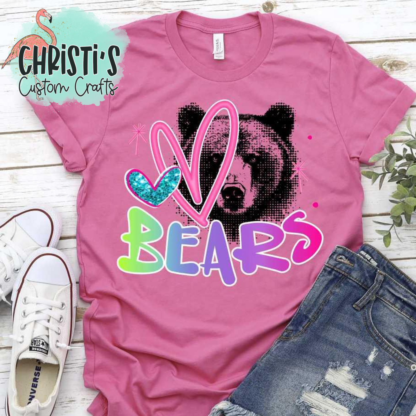 Black Dot Mascot with Rainbow Mascot Name and Pink Heart