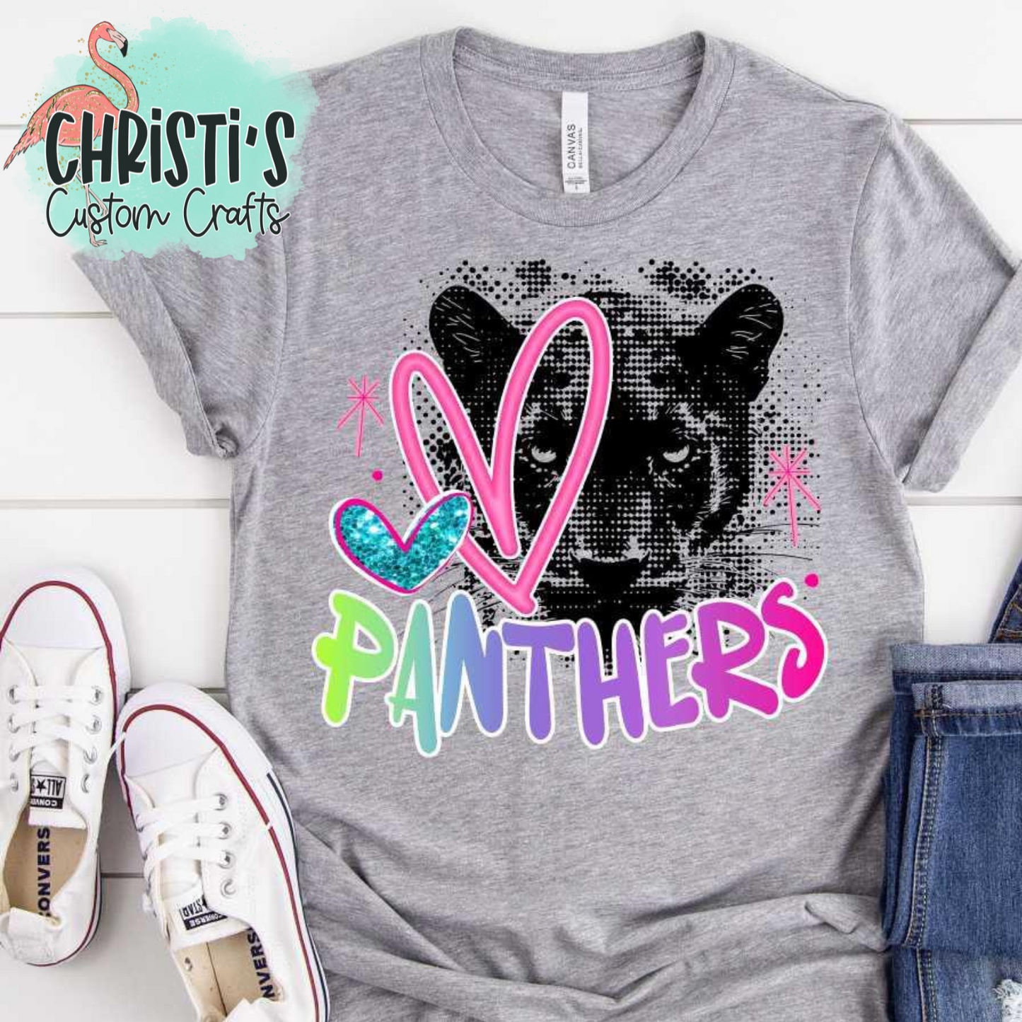 Black Dot Mascot with Rainbow Mascot Name and Pink Heart